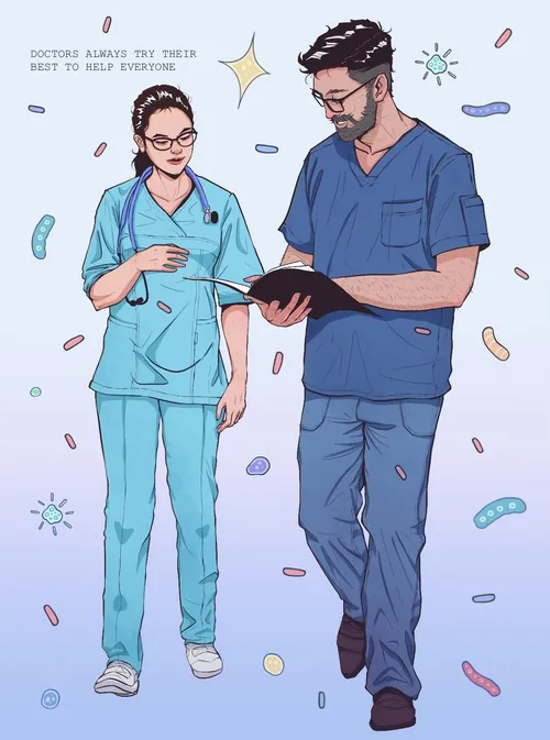 Two doctors in scrubs reading medical notes by Yogi Fahmi Riandito