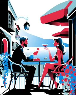 Couple sitting at outdoor cafe table having drinks