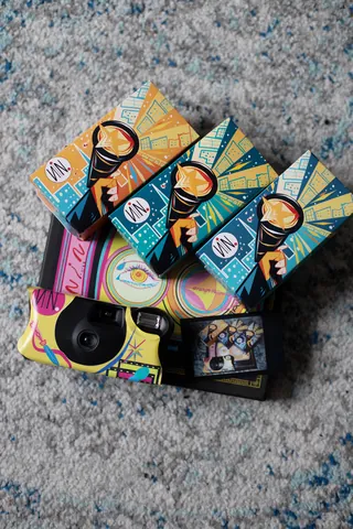 Kodak One Time Camera packaging with colorful flashlight city designs