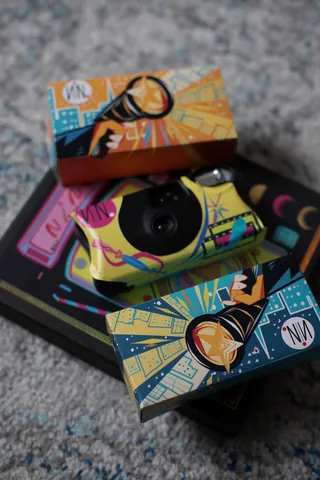 Kodak One Time Camera with colorful flashlight-themed packaging
