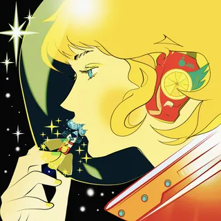 Profile of a woman with starry background holding sparkling object close to lips
