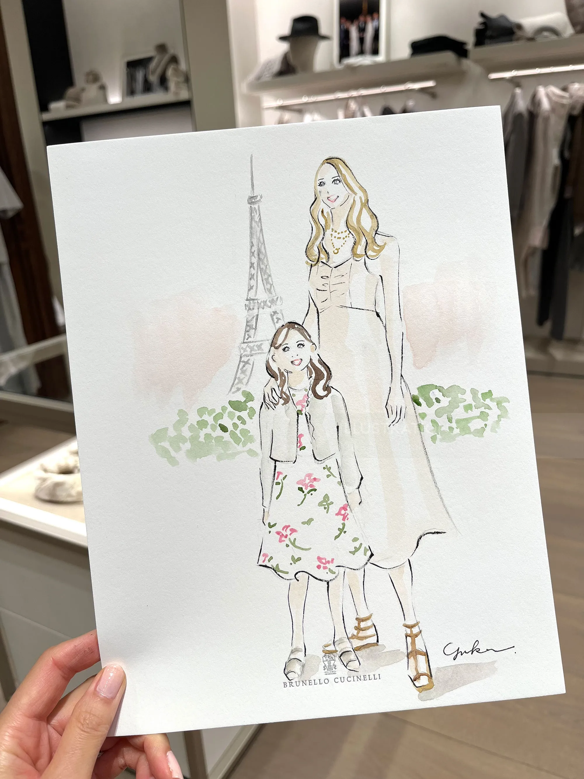 Fashion illustration of woman and girl with Eiffel Tower background