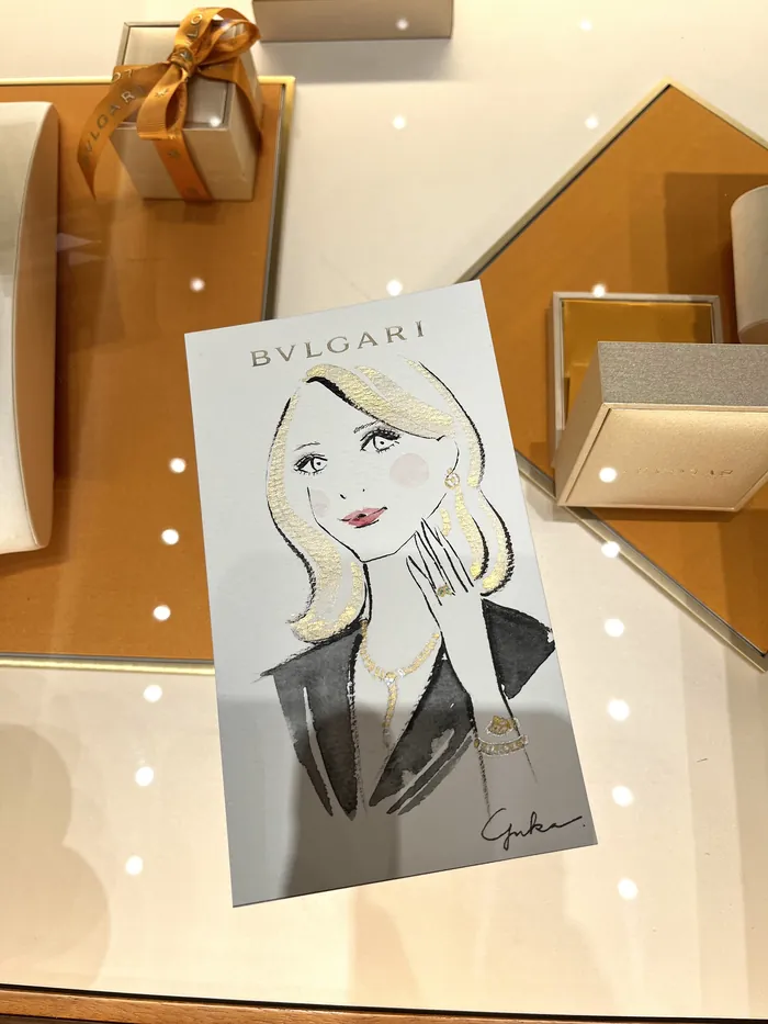 Illustration of a blonde woman wearing Bulgari jewelry