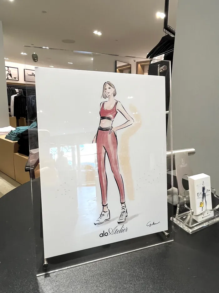 Illustration of woman in red athletic wear on display stand