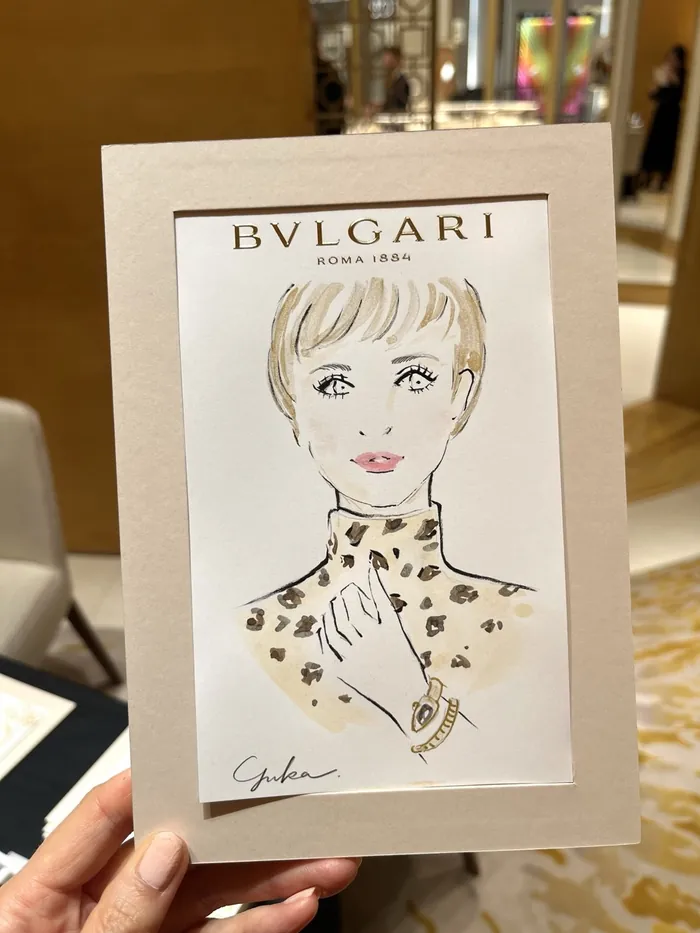 Illustration of a woman wearing a leopard print top and a watch