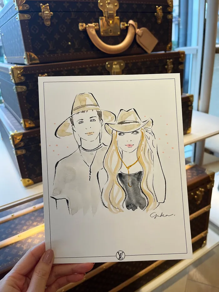 Illustration of a man and woman wearing hats at Louis Vuitton event