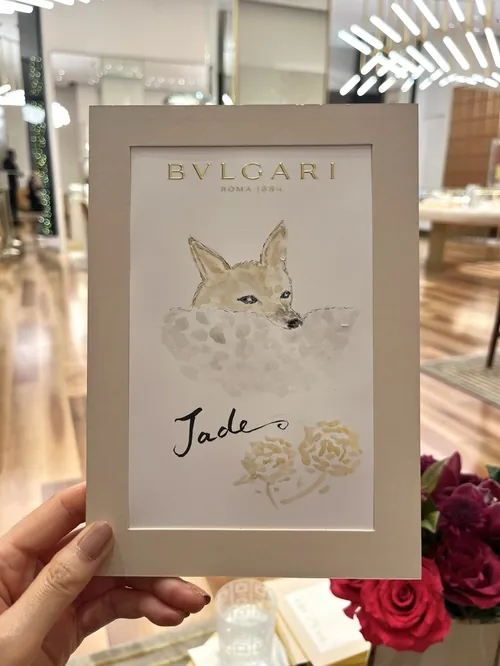 Illustration of a fox with flowers and the word Jade