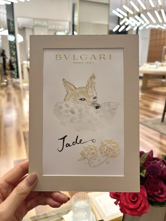 Illustration of a fox with flowers and the word Jade