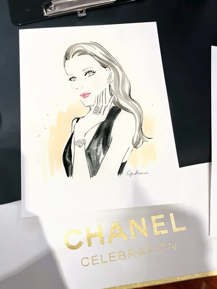 Fashion illustration of a woman at Chanel live event