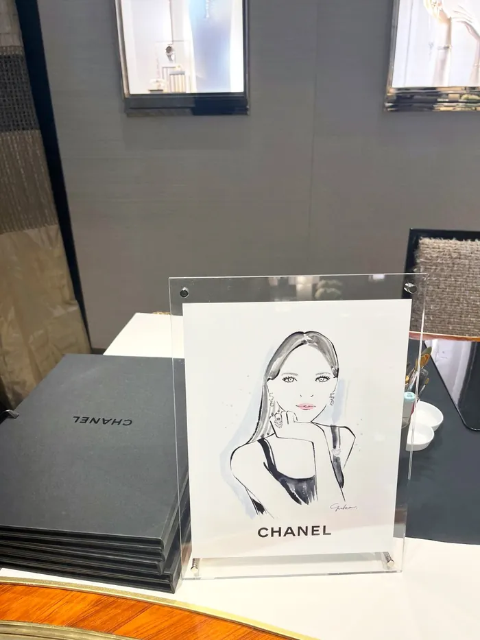 Illustration of a woman at Chanel live event display