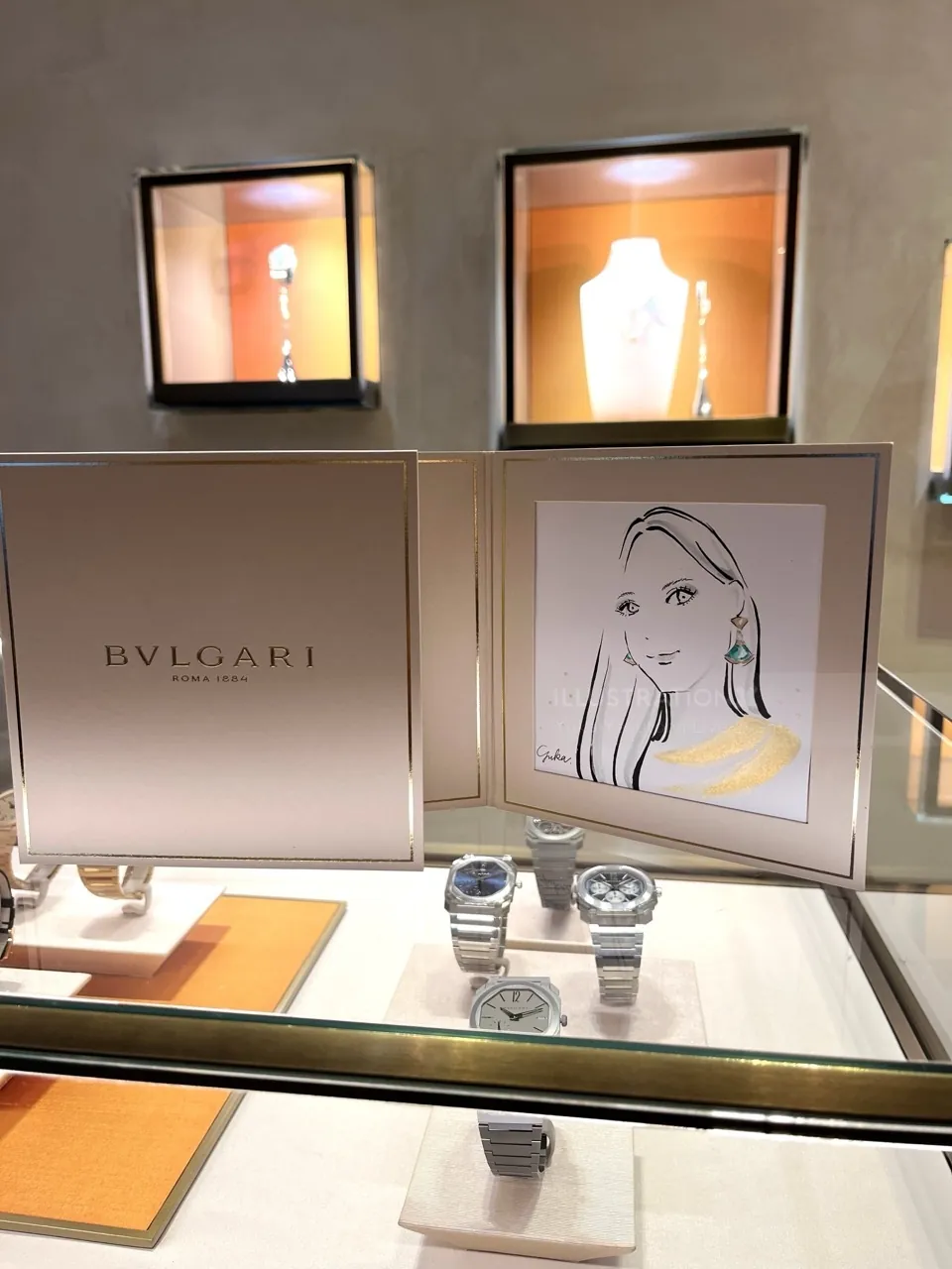 Bulgari watches and jewelry displayed in luxury store setting