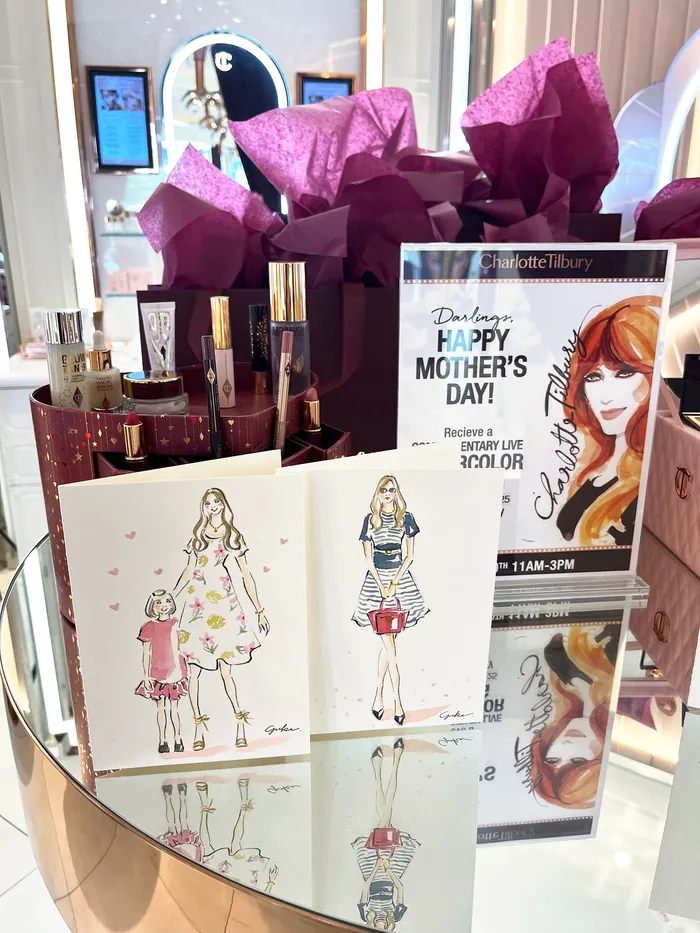 Charlotte Tilbury beauty products and Mother's Day greeting cards display