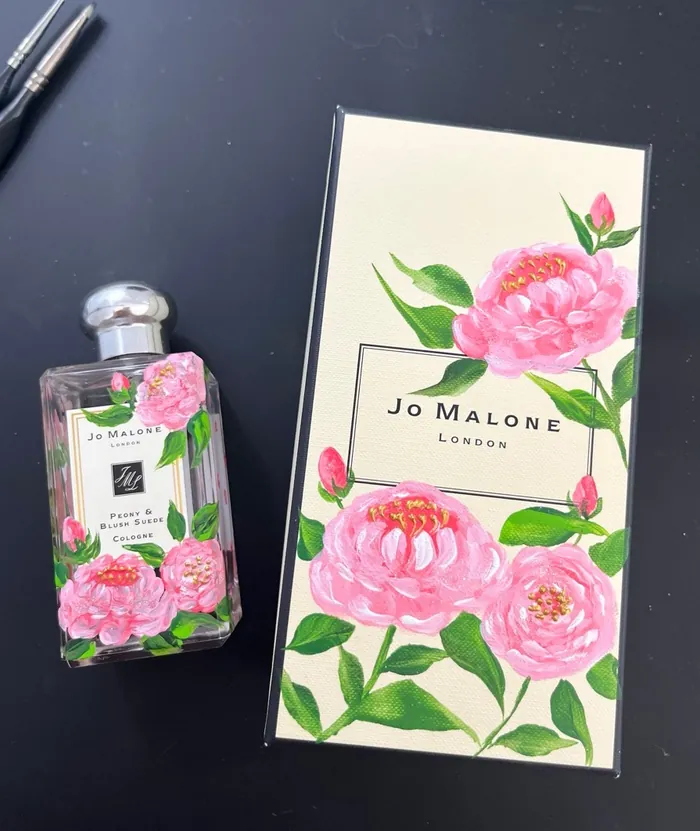 Jo Malone perfume bottle and box with pink floral design