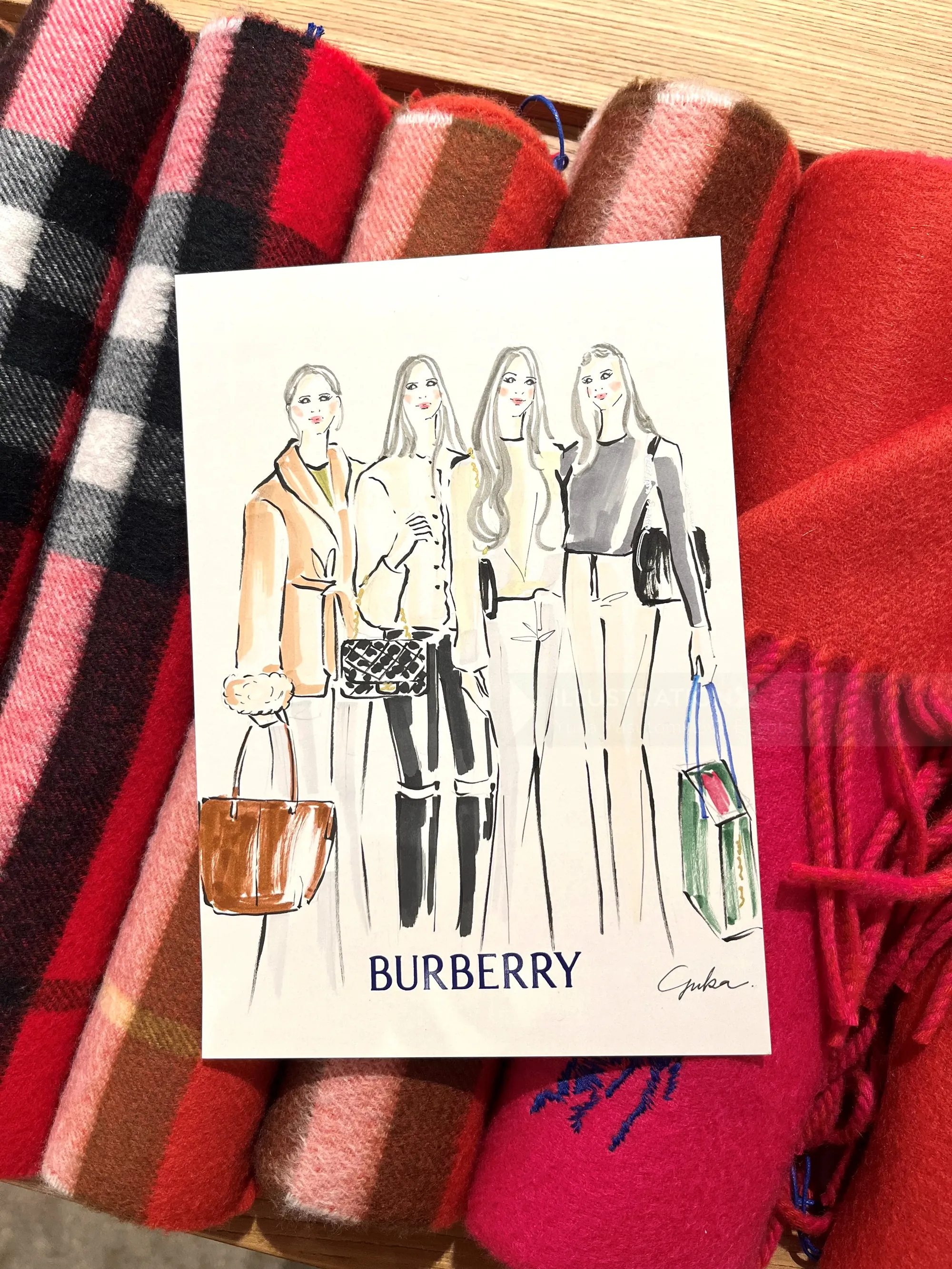 Fashion illustration of models with Burberry scarves by Yuka Yasutomi