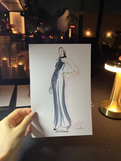 Fashion sketch of a woman in an elegant evening gown by Yuka Yasutomi