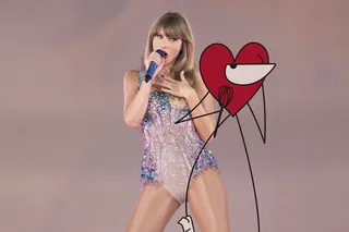 Female singer in glittery outfit singing with cartoon heart drawing