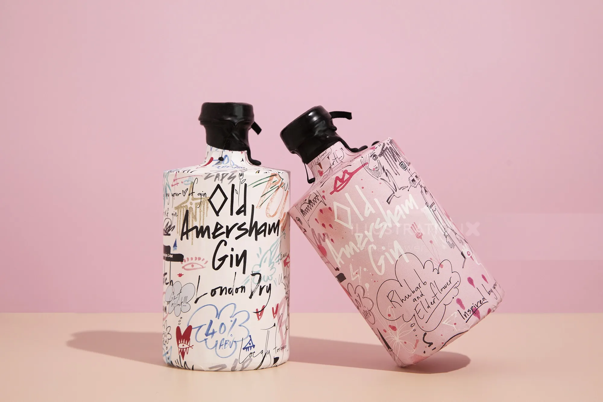 Two artistic gin bottles with handwritten designs by Nadia Flower