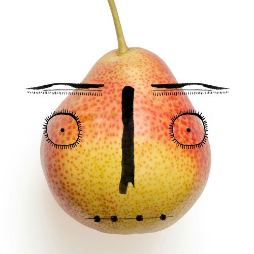 Pear with a face drawn on it by Nadia Flower