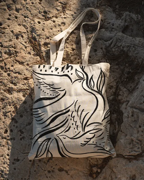 Canvas tote bag with abstract bird design by Nadia Flower