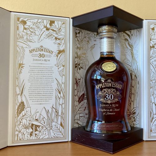 Appleton Estate 30 Year Rum bottle in open box with intricate design by Nadia Flower