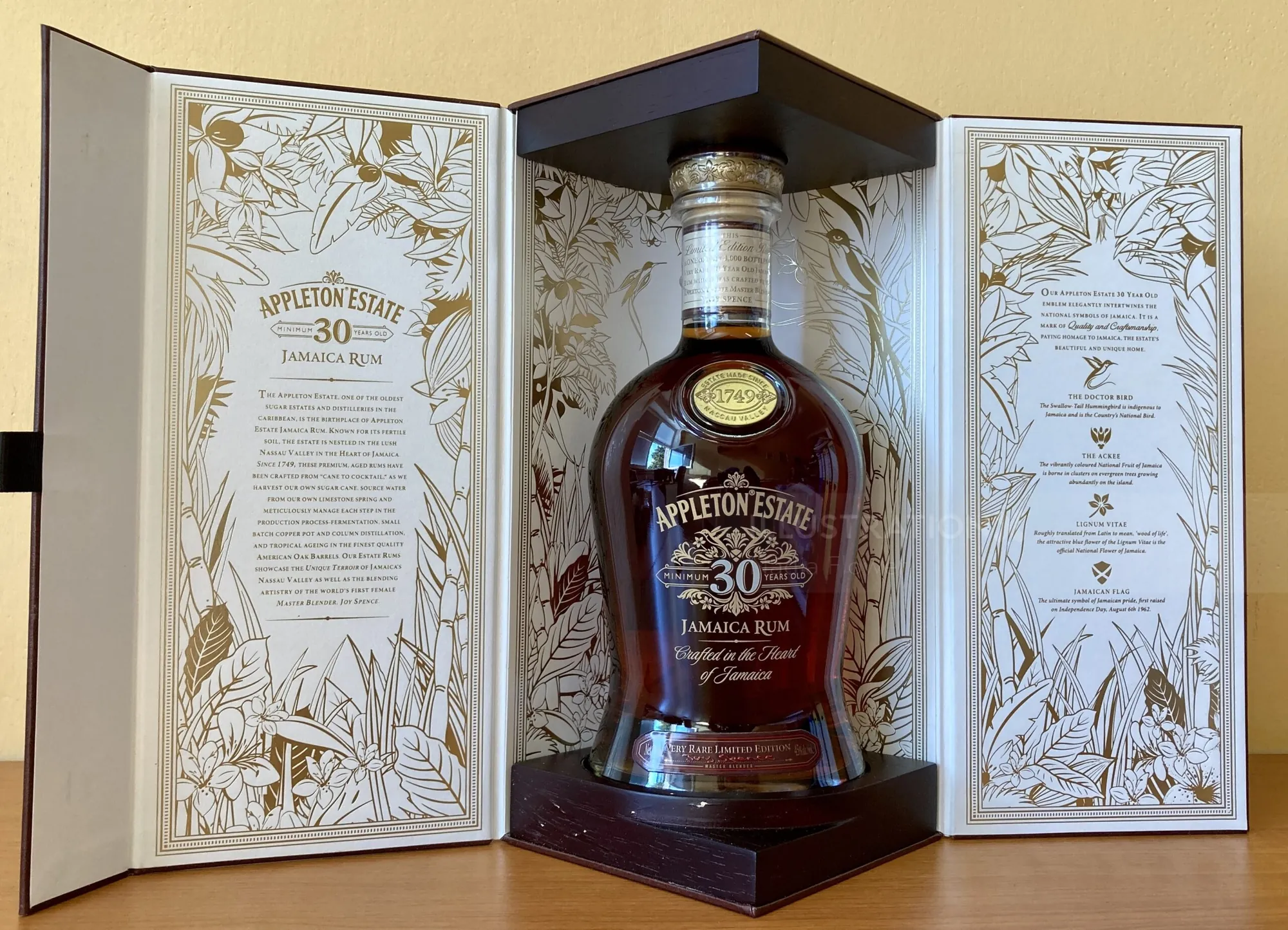 Appleton Estate 30 Year Rum bottle in open box with intricate design by Nadia Flower