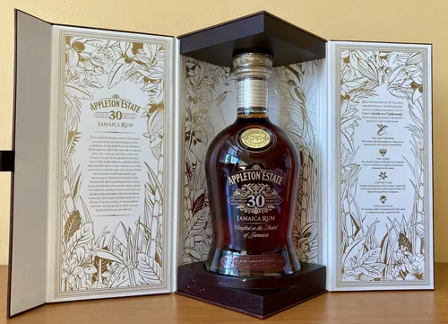 Appleton Estate 30 Year Rum bottle in open box with intricate design by Nadia Flower