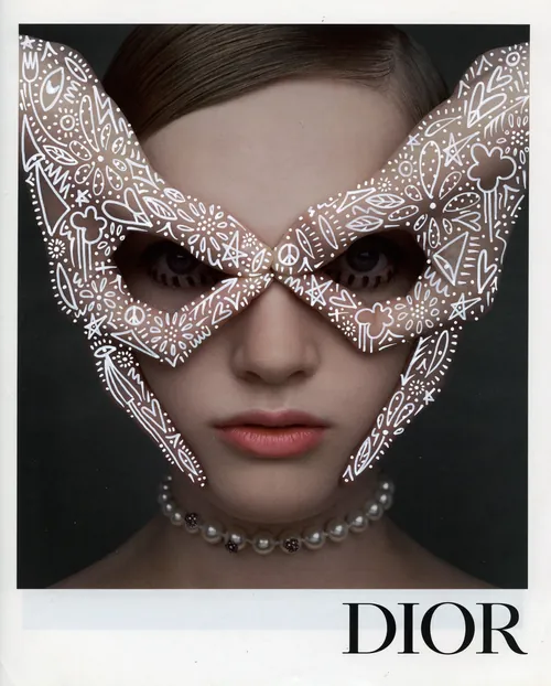 Portrait of woman with Dior face mask and pearl necklace by Nadia Flower