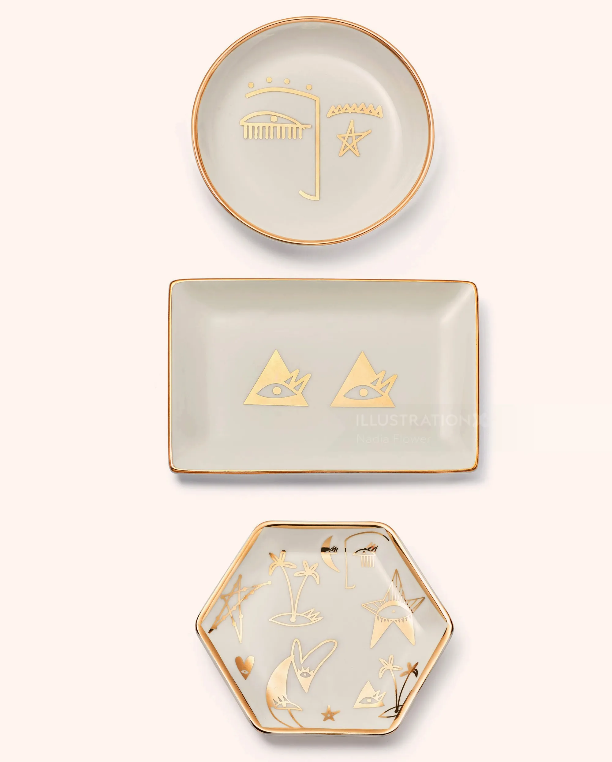 Minimalist ceramic plates with gold line art and shapes by Nadia Flower