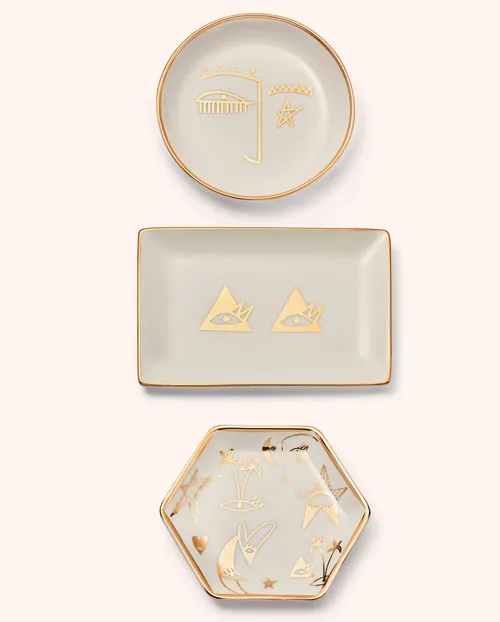 Minimalist ceramic plates with gold line art and shapes by Nadia Flower