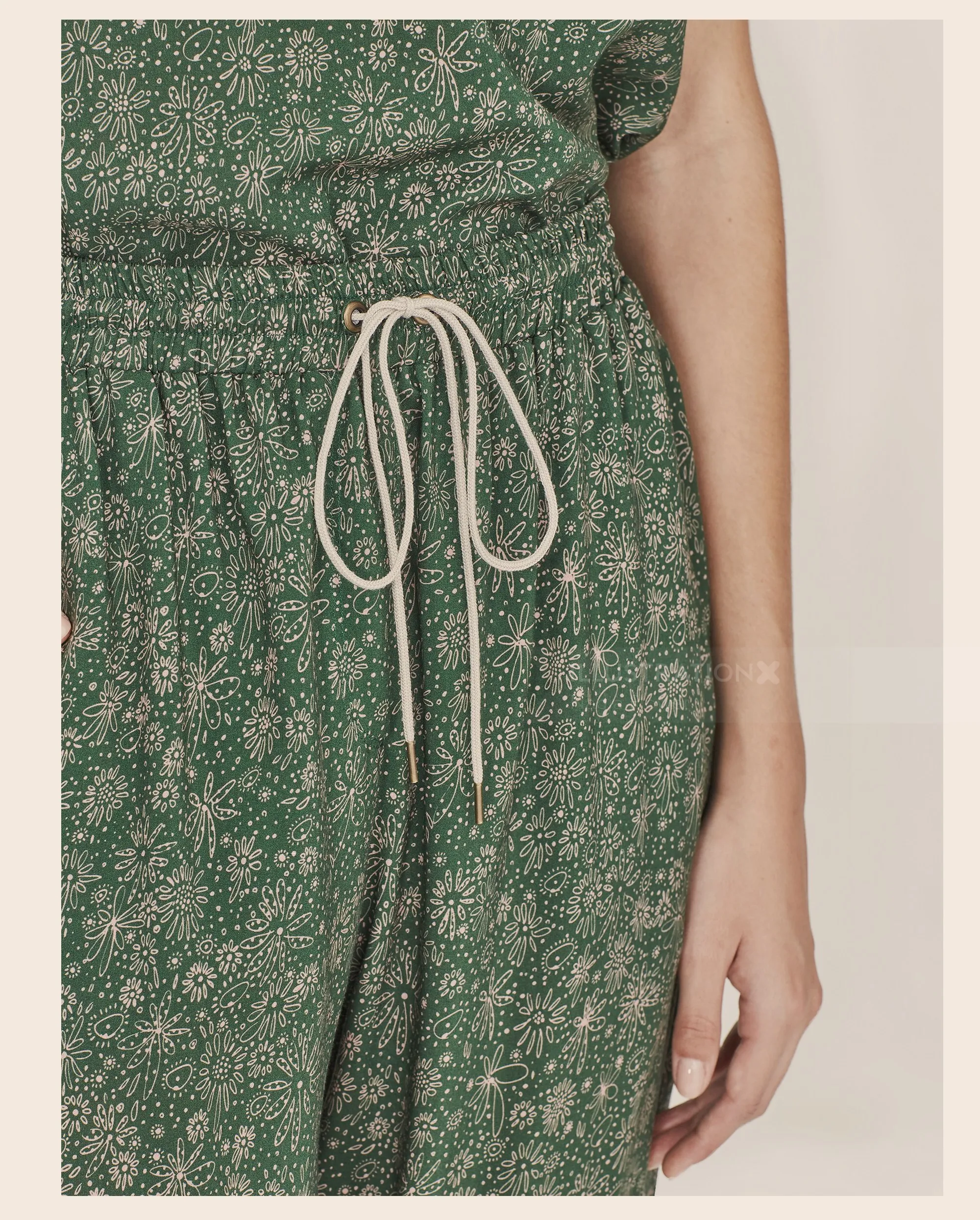 Nadia Flower's green floral jumpsuit with a drawstring waist