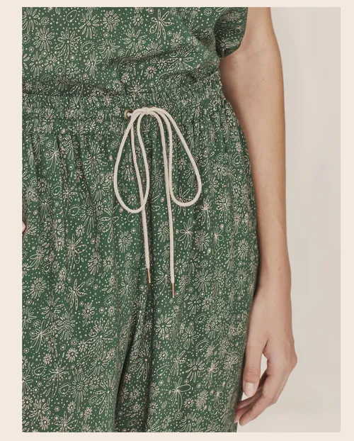 Nadia Flower's green floral jumpsuit with a drawstring waist