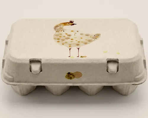 Nadia Flower artwork showing a delicate bird painted on a closed egg carton