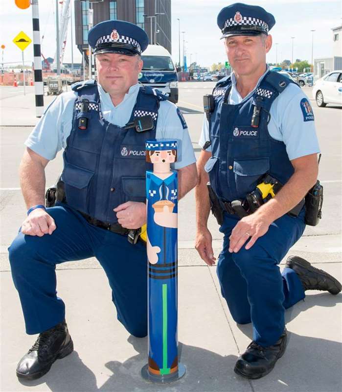 Policeman with painting of Policeman 