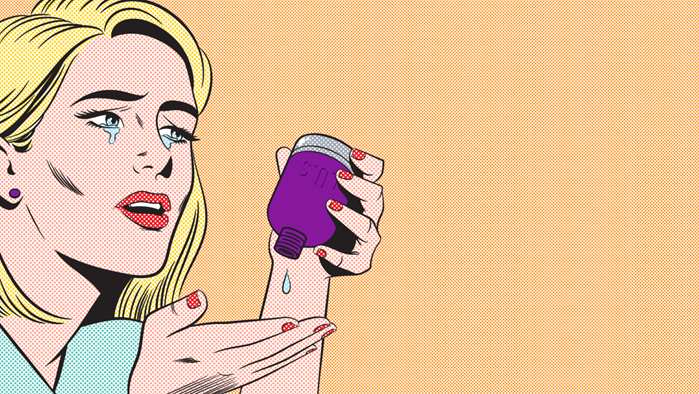 woman using perfume