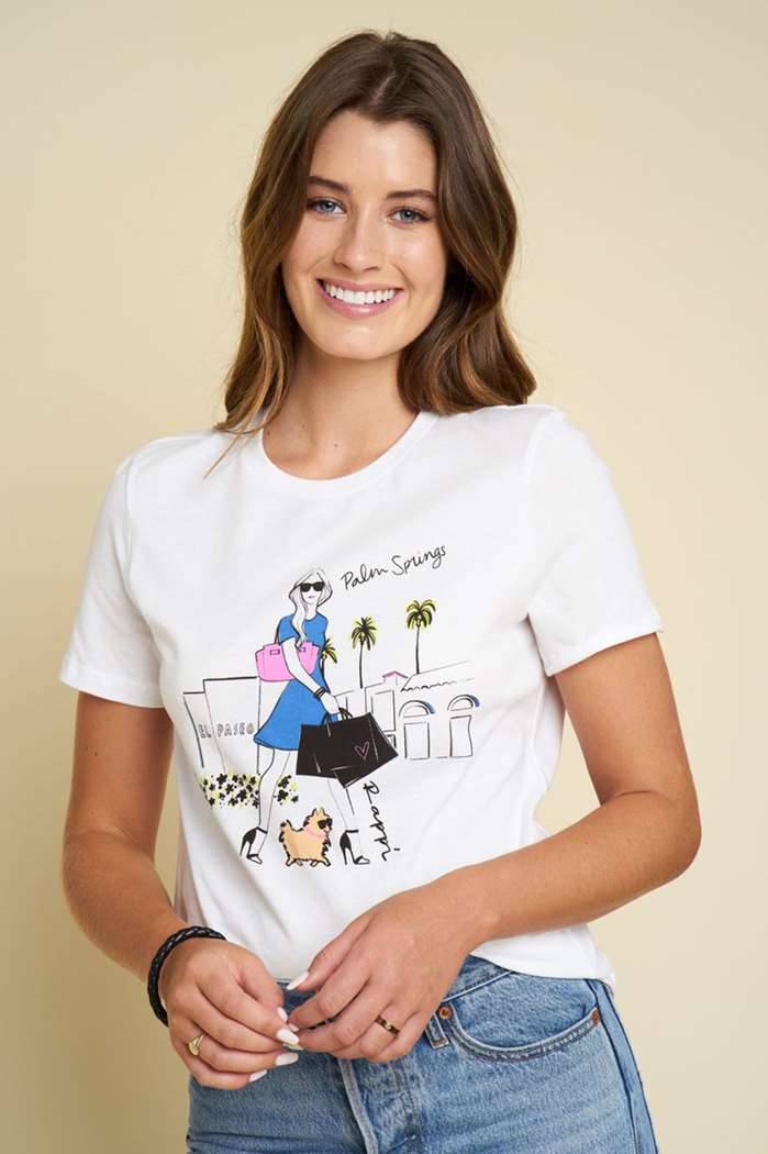 girl wearing palm spring tee