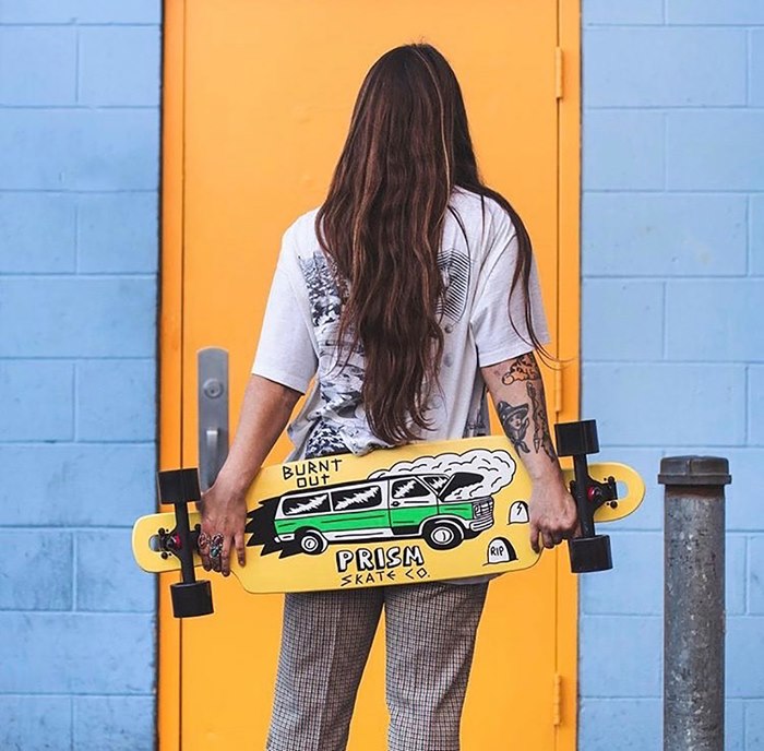 Girl with Prism skateboard