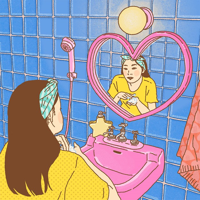 Woman applying Bioré facial wash