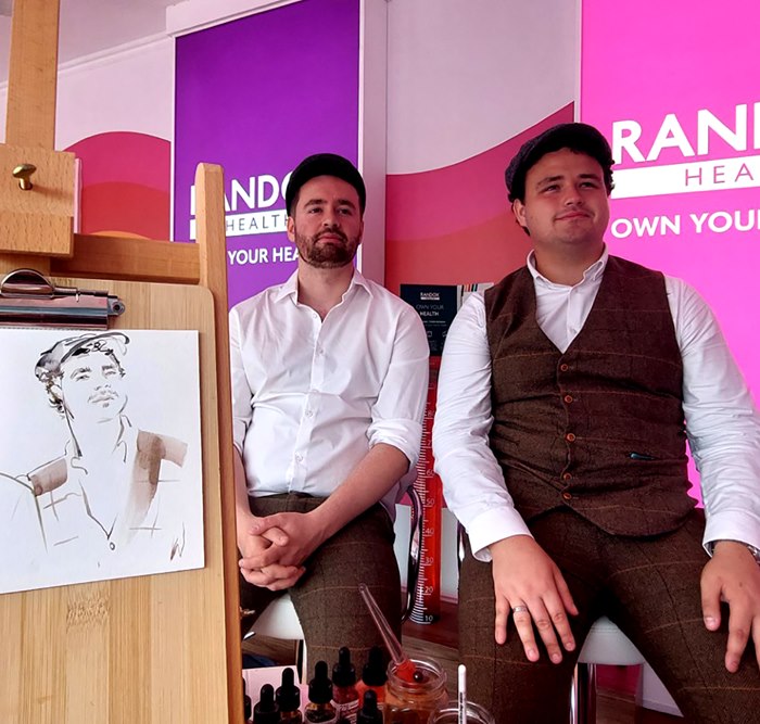 Katharine live event drawing in the Randox Health'shop