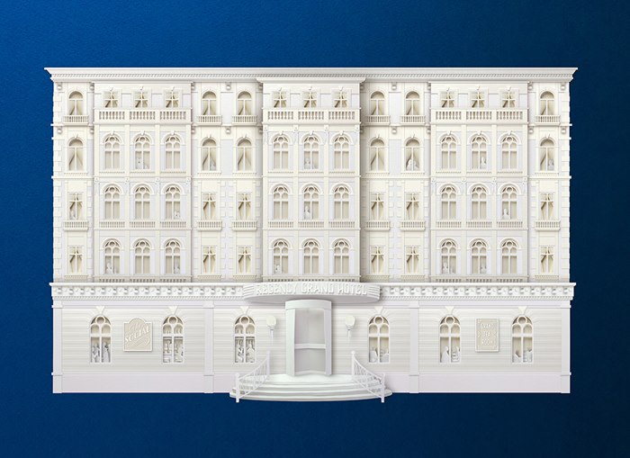 Sculpture of a hotel built entirely out of paper