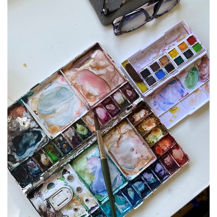 Watercolors and painting brushes illustration