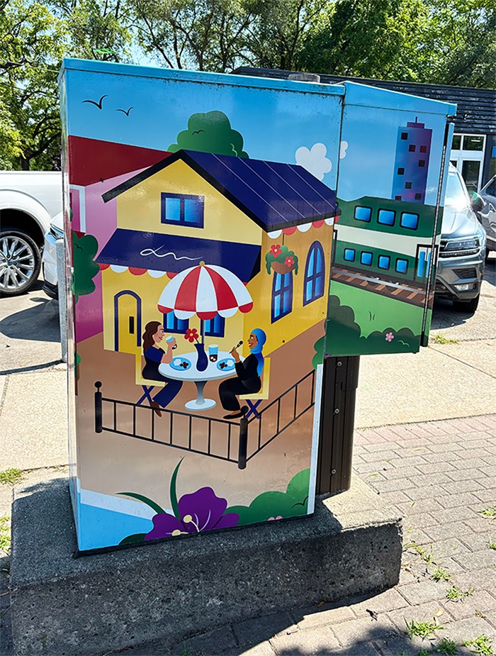 Community mural blending natural beauty and local pride